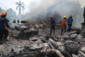 At least 30 killed as military plane crashes in residential area of Medan, Indonesia